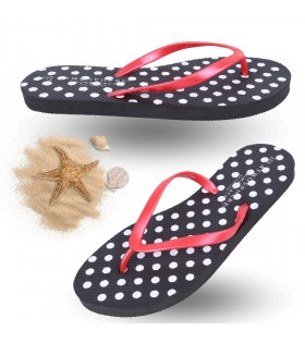 Schwarze gepunktete Flip-Flops